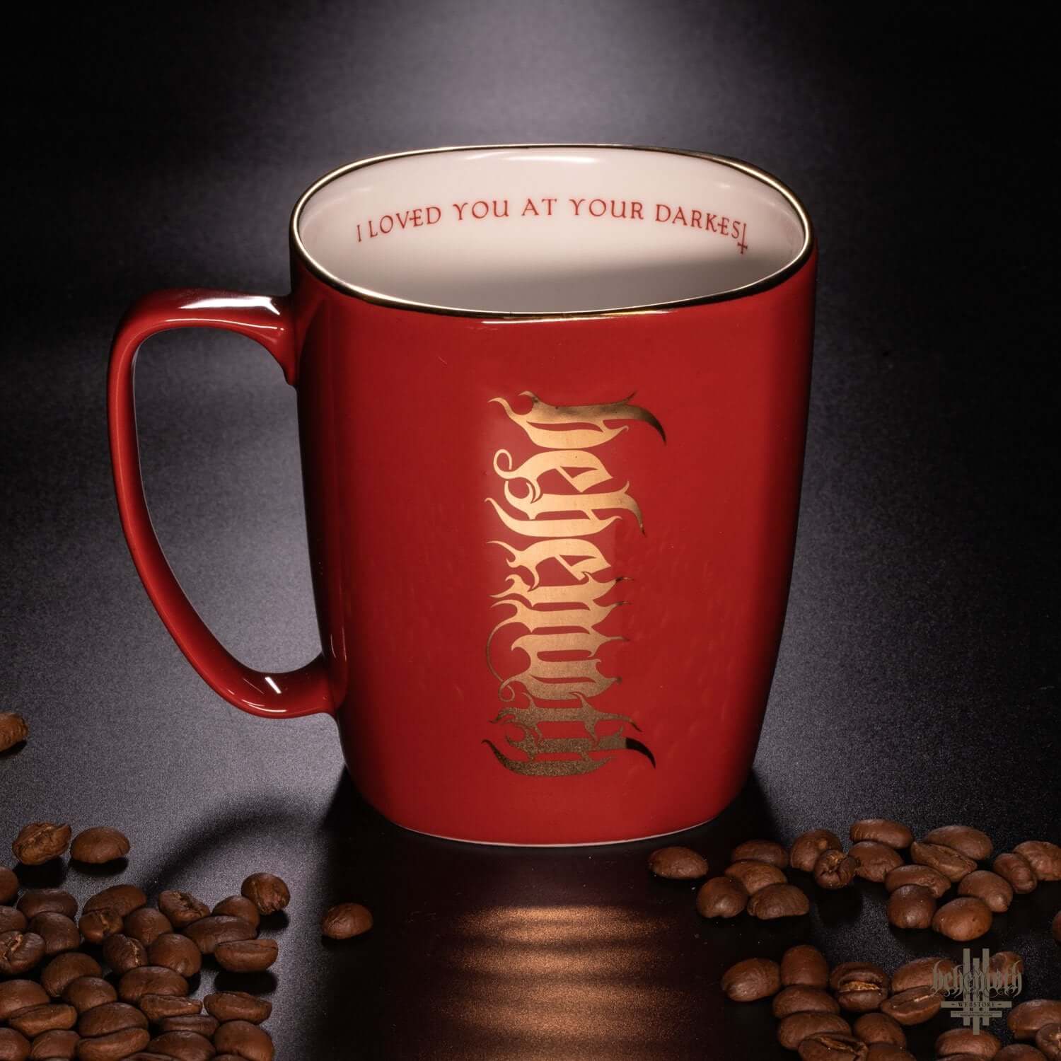 Red porcelain Behemoth mug with gold Trivmviratvs print, 'I Loved You At Your Darkest' inside, and Behemoth logo, not dishwasher safe.