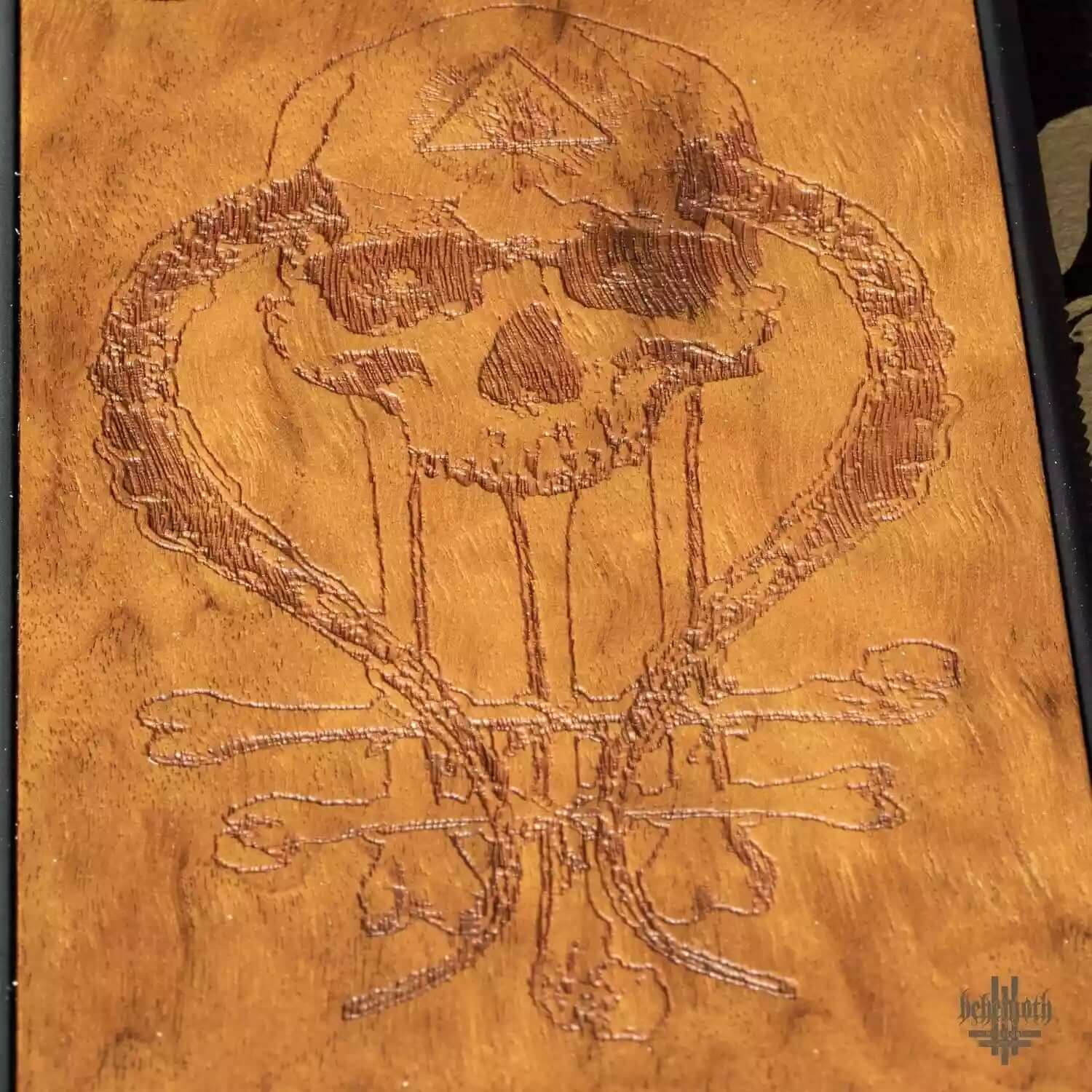 Engraved skull design on Samsung Galaxy S9+ wood finish case, featuring In Absentia Dei logo, by Behemoth, made with Imbuia wood.