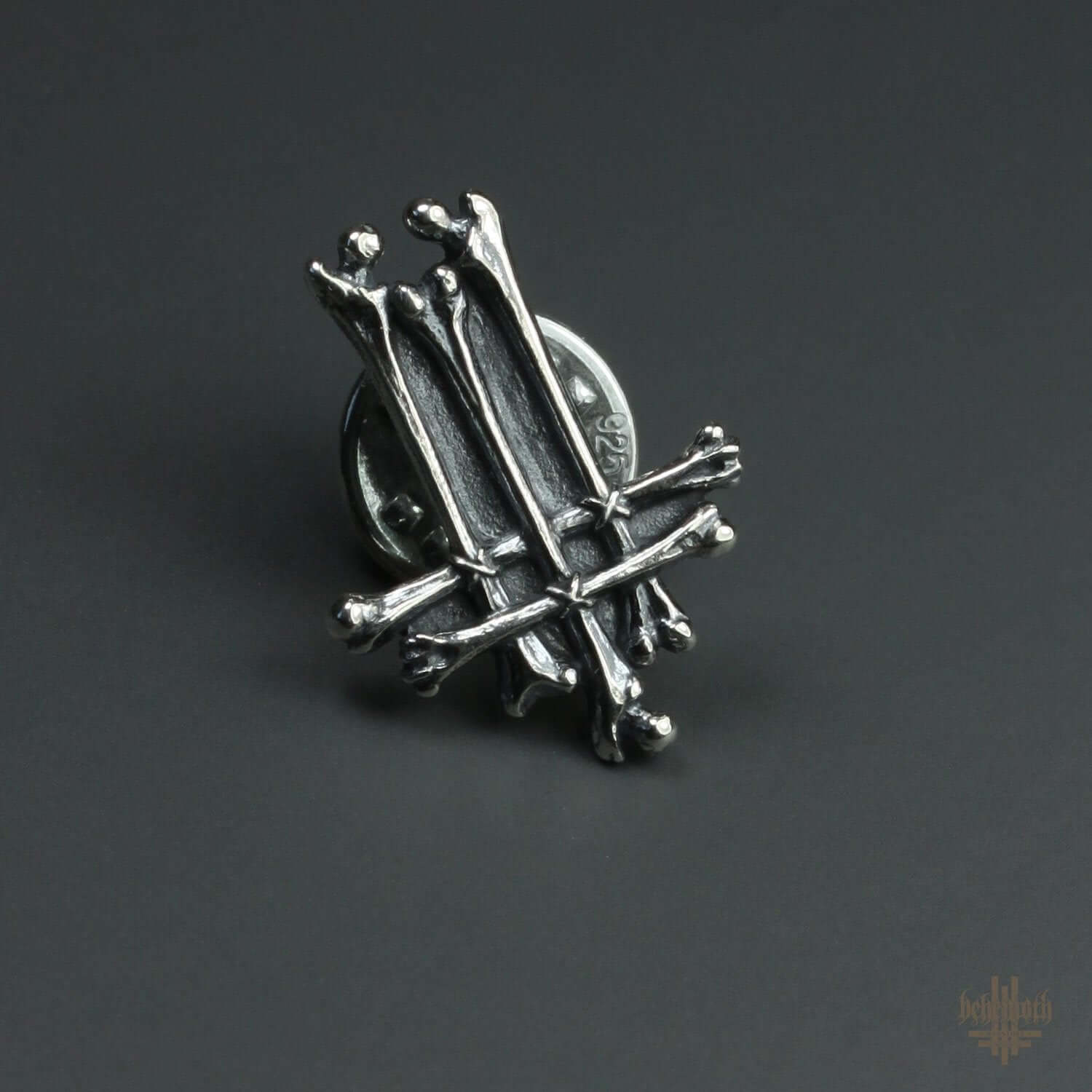 Sterling silver pin with detailed sculpted bones, handcrafted and oxidized for an antique look, from Anna Mazon Jewellery.