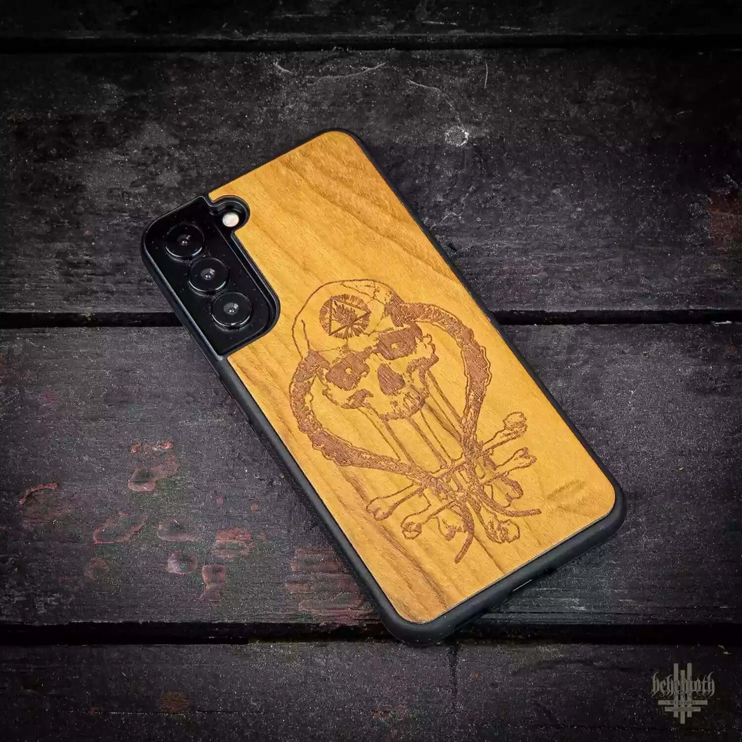 Samsung Galaxy S22 Plus case with wood finish and Behemoth logo, handcrafted in Poland from exotic Imbuia wood.