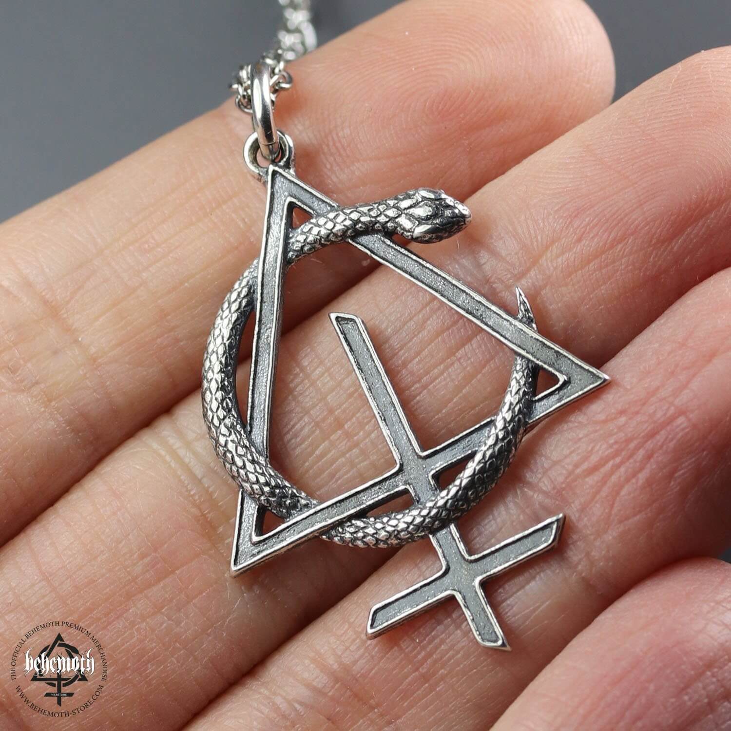 Behemoth 'CONTRA' sterling silver necklace with openwork snake and triangle pendant, hand sculpted and oxidized for detail.