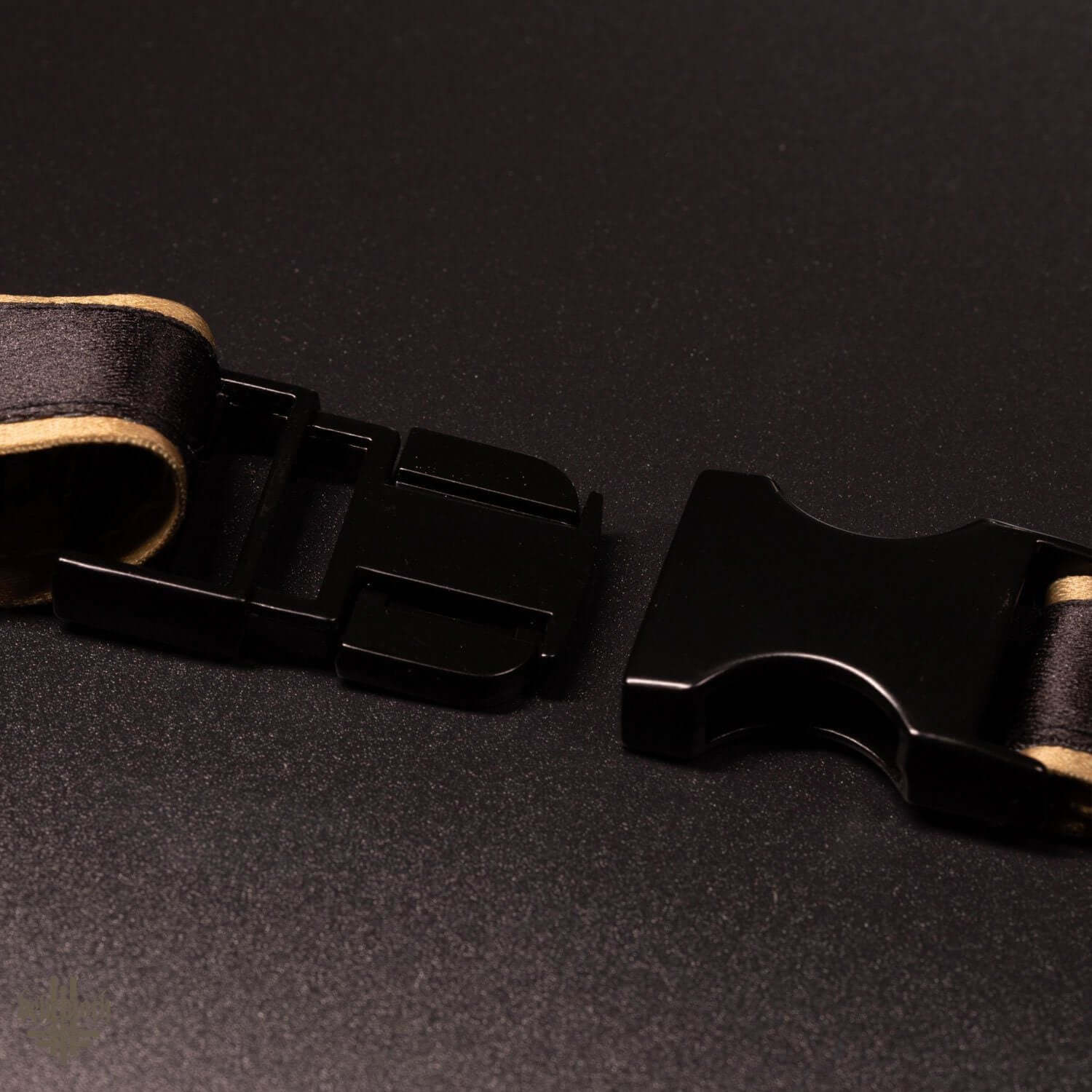 Close-up of the black metal clip on Behemoth 'Opvs Contra Natvram' lanyard, showcasing premium quality and sublimation printed strap.