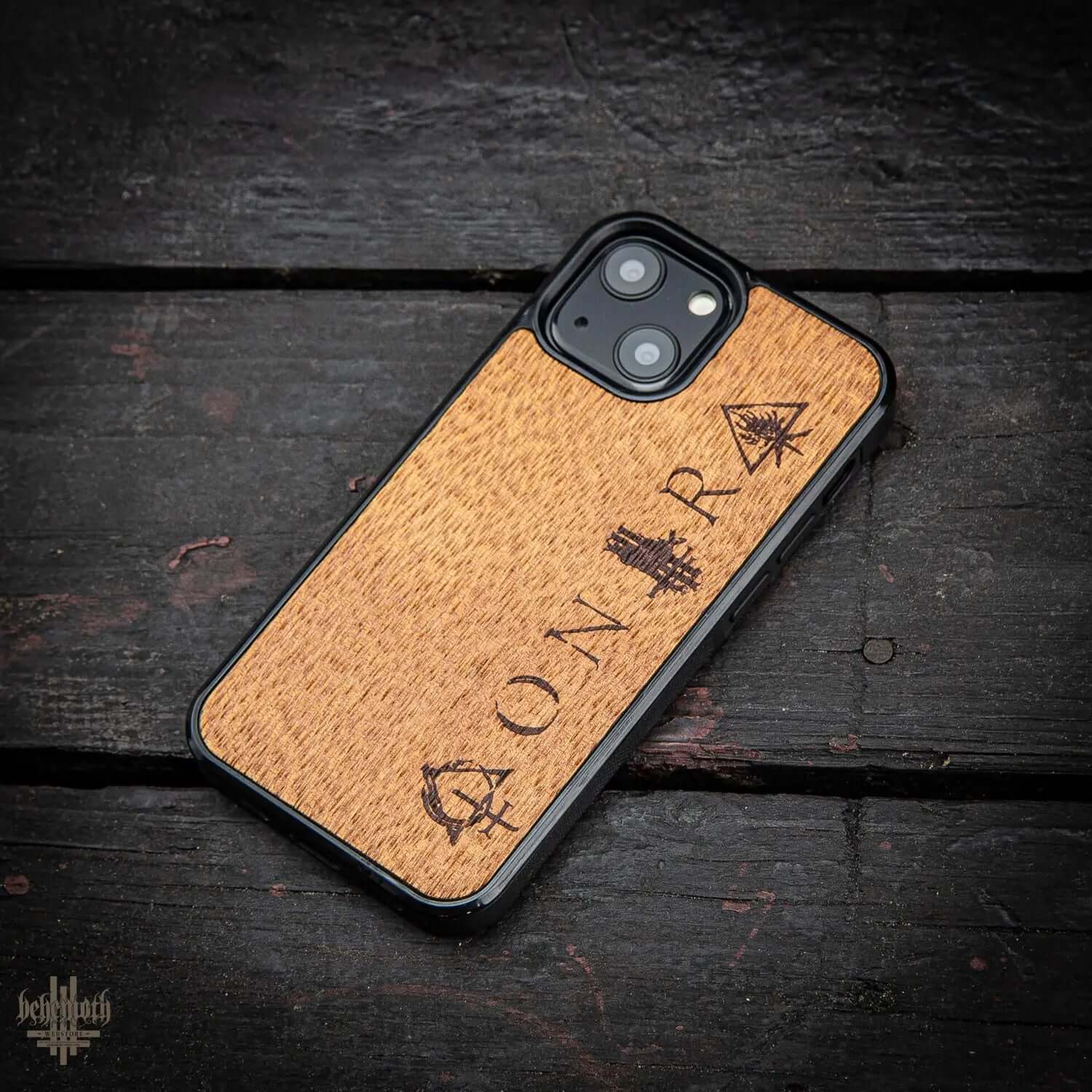 iPhone 13 Mini case with merbau wood finish, Behemoth 'CONTRA' logo, hand-finished in Poland, polycarbonate base, impact-resistant.