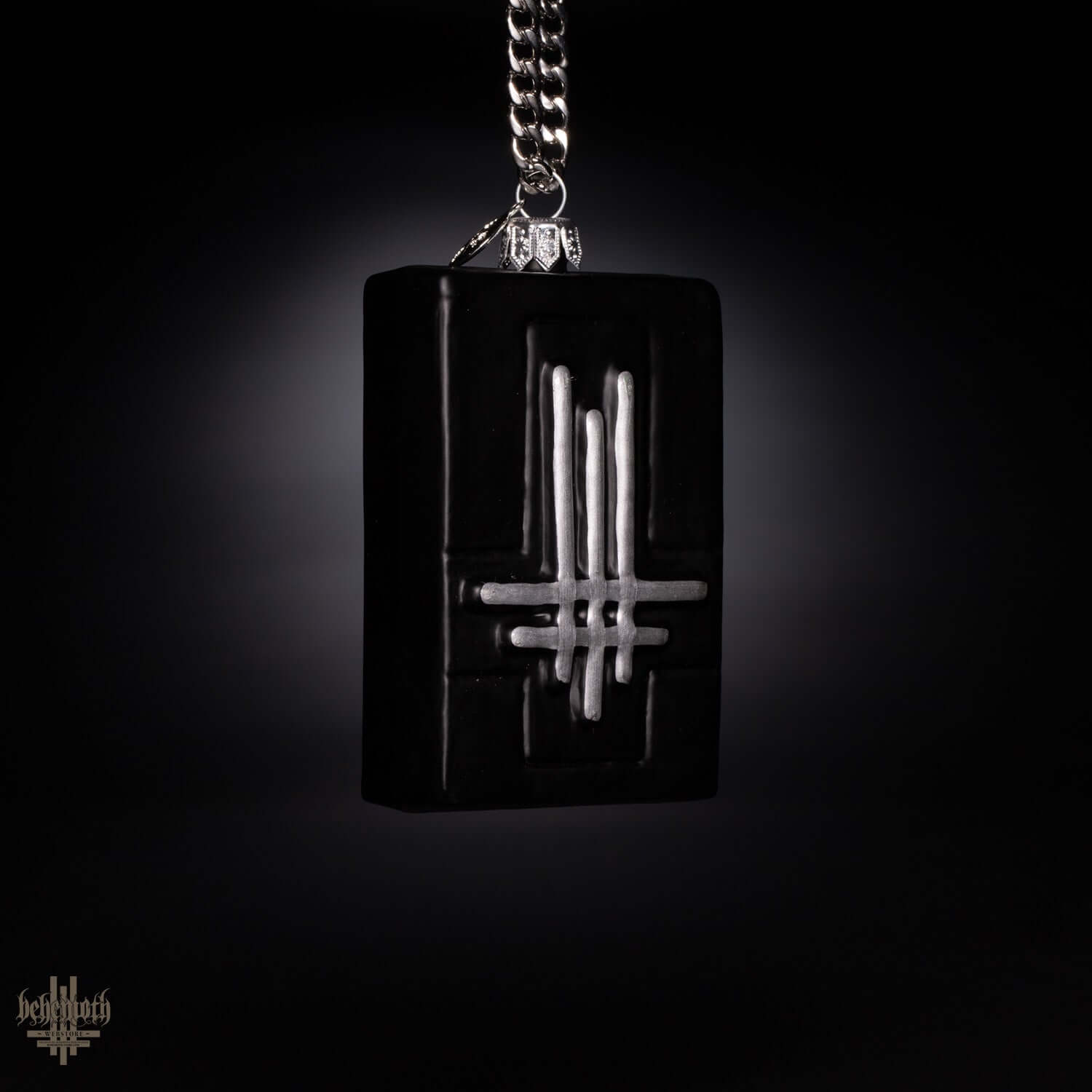 Blown glass black ornament with silver Behemoth emblem, part of the Behemoth gift set. Handmade in Poland.