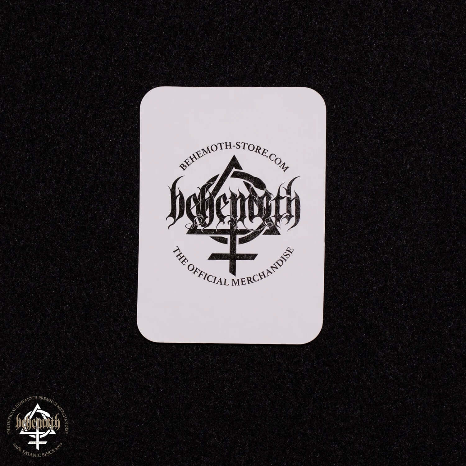 Official Behemoth merchandise sticker featuring the logo and website on a dark background.