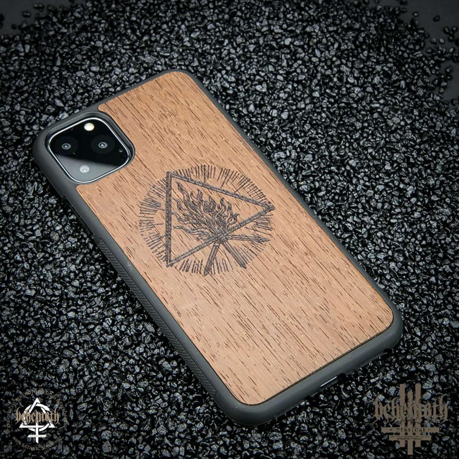 iPhone 11 Pro Max wood case with Behemoth 'The Unholy Trinity' logo, handcrafted in Poland with merbau wood and polycarbonate base.
