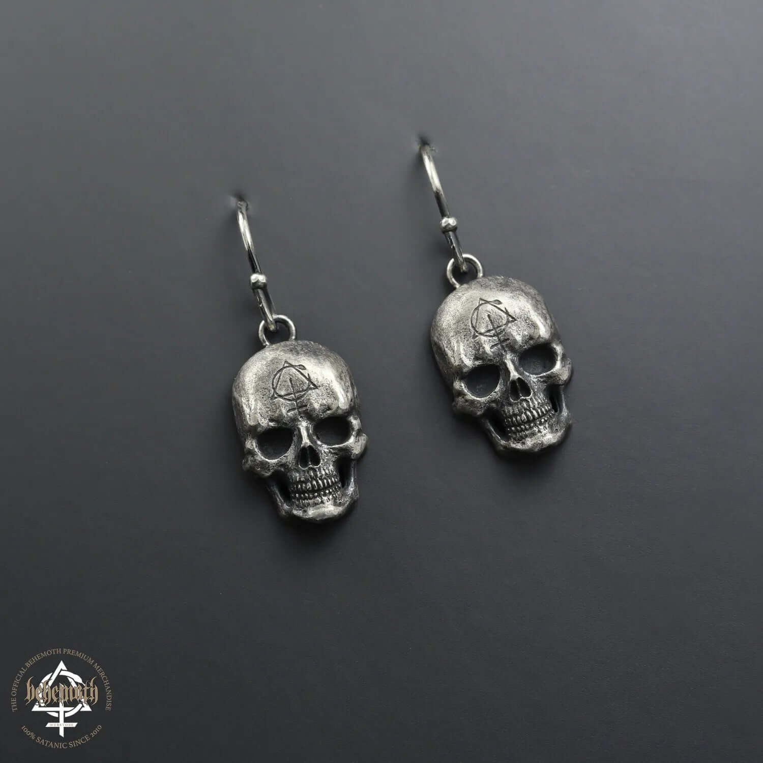 Contra Skull sterling silver earrings, hand sculpted and oxidized, showcasing detailed skull design by Anna Mazon Jewellery.