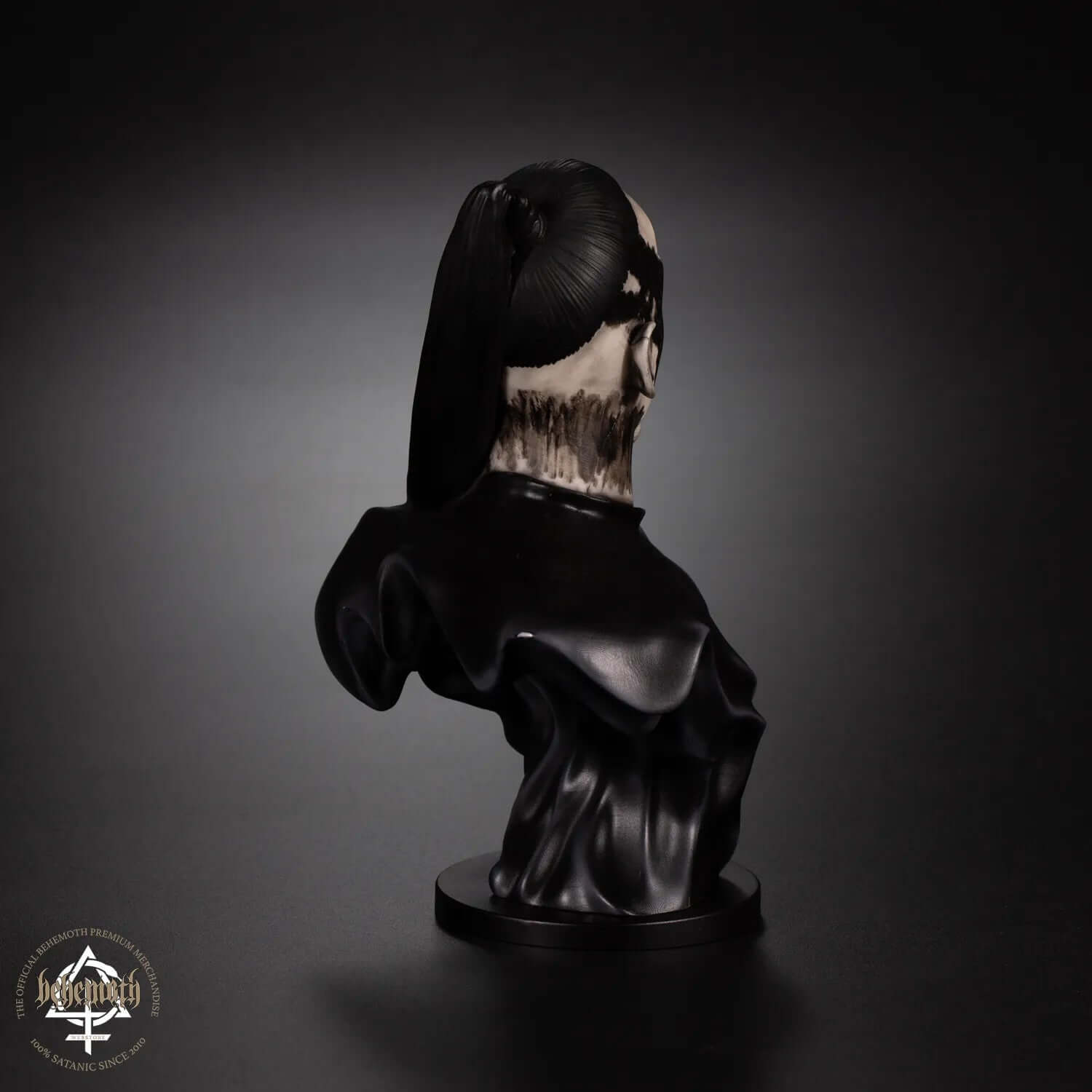 Back view of hand-painted Orion Behemoth collectible figurine made of polyurethane resin, featuring unique design and engraved metal coin.