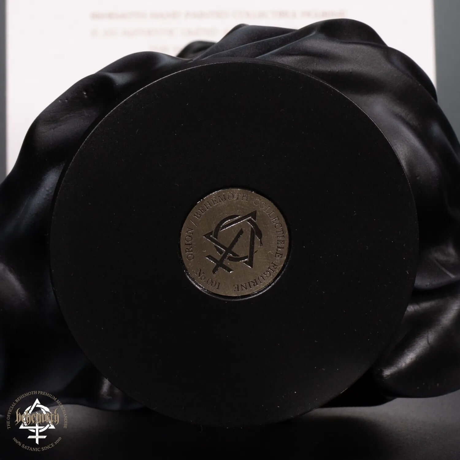 Unique numbered Orion/Behemoth collectible figurine base with engraved 'Contra' metal coin, showcasing hand-painted details.