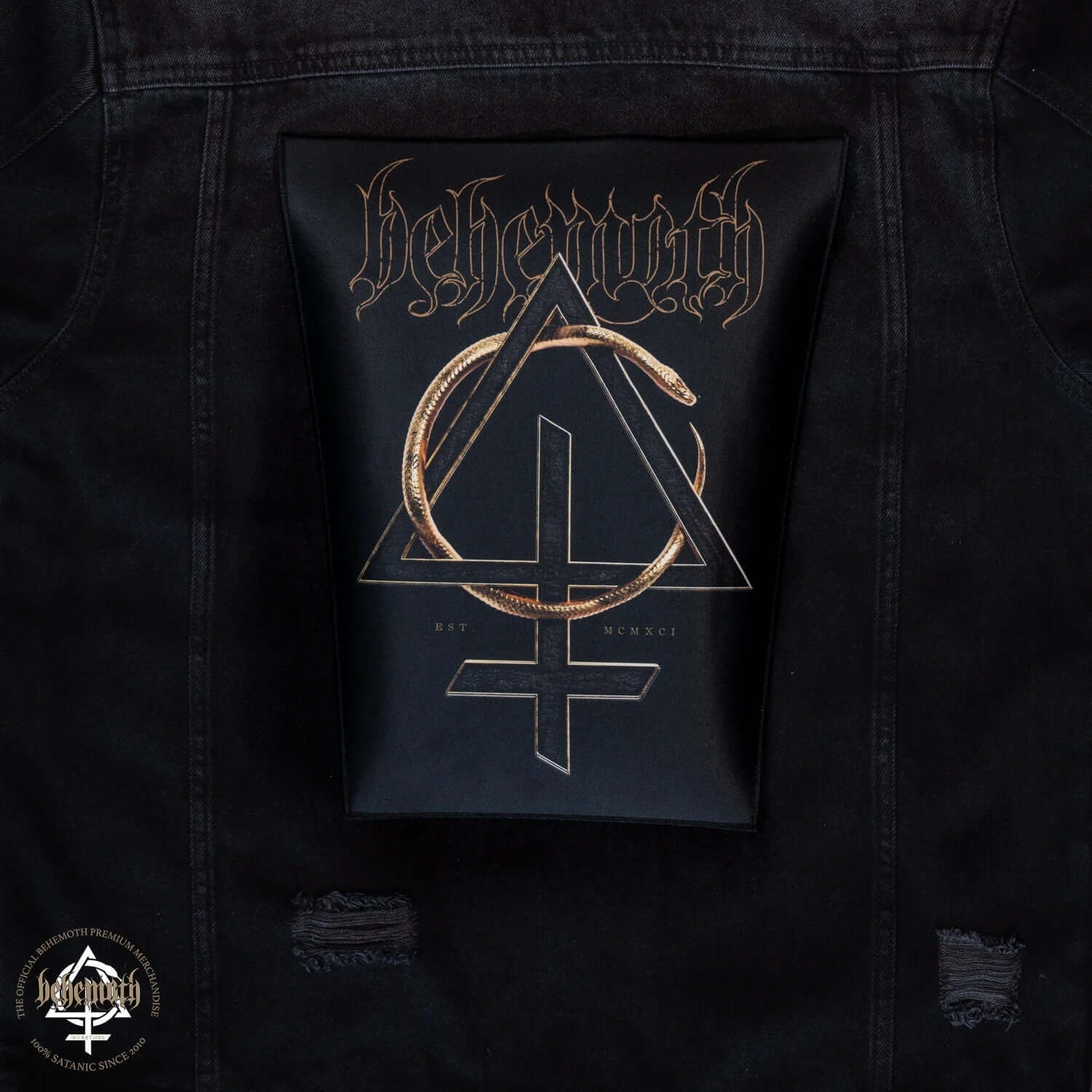 Behemoth 'Contra - Black' iron-on back patch displayed on a jacket, showcasing a printed gold emblem with a gothic design.