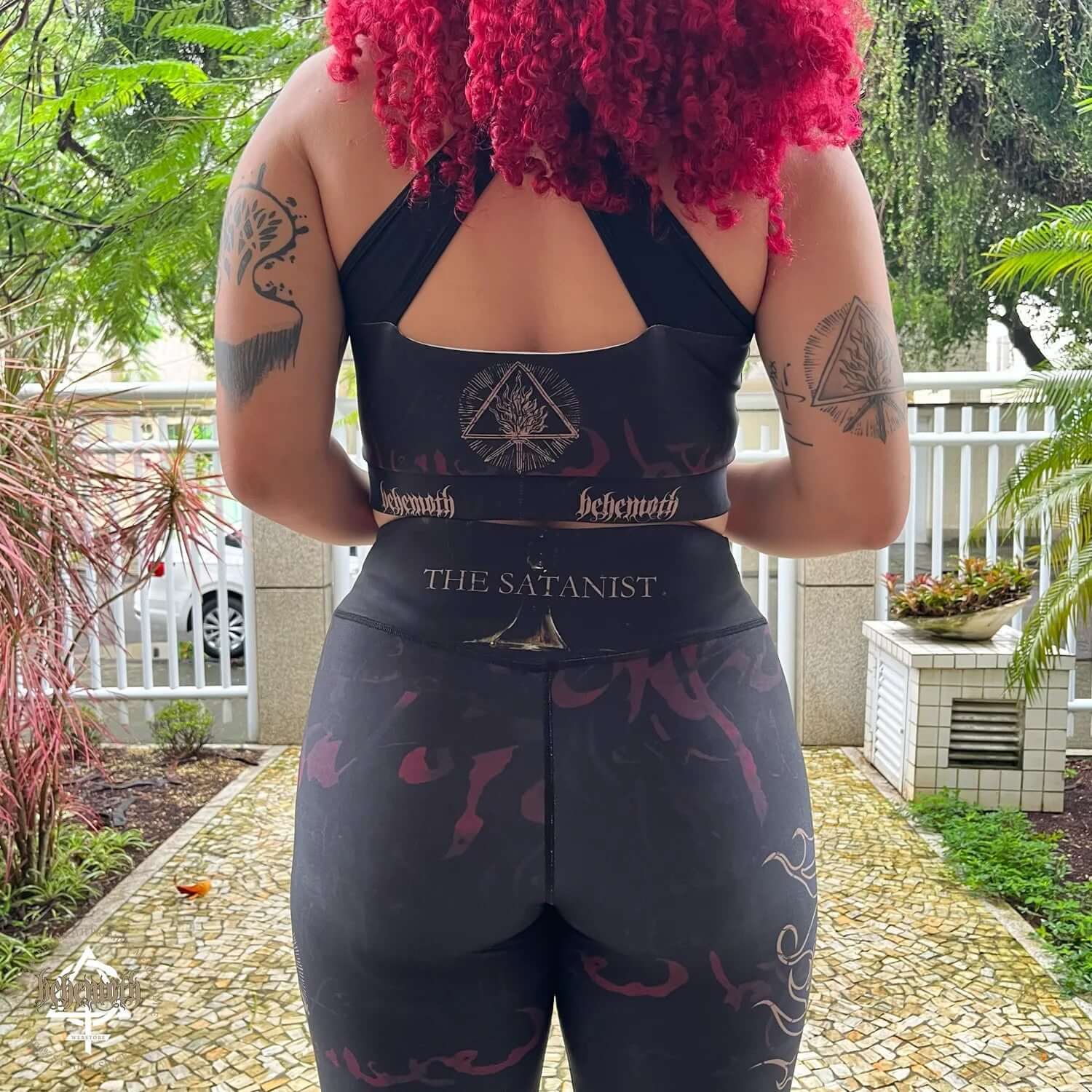 Back view of Behemoth 'The Satanist' sports bra, featuring dark graphics and supportive straps, ideal for gym and fitness activities.