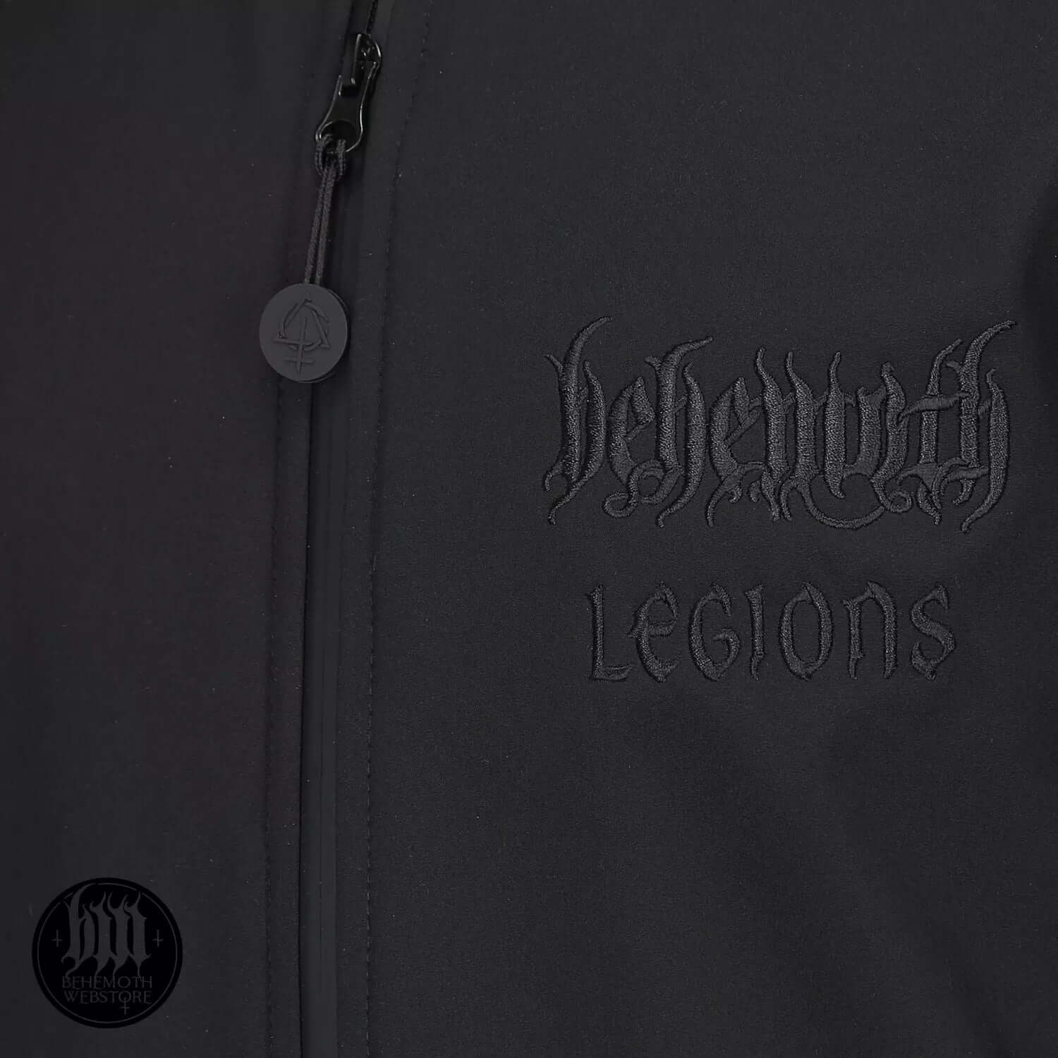 Behemoth Legions Softshell Jacket detail with embroidered logos on chest, black zip puller, part of Blackest Ov The Black collection.