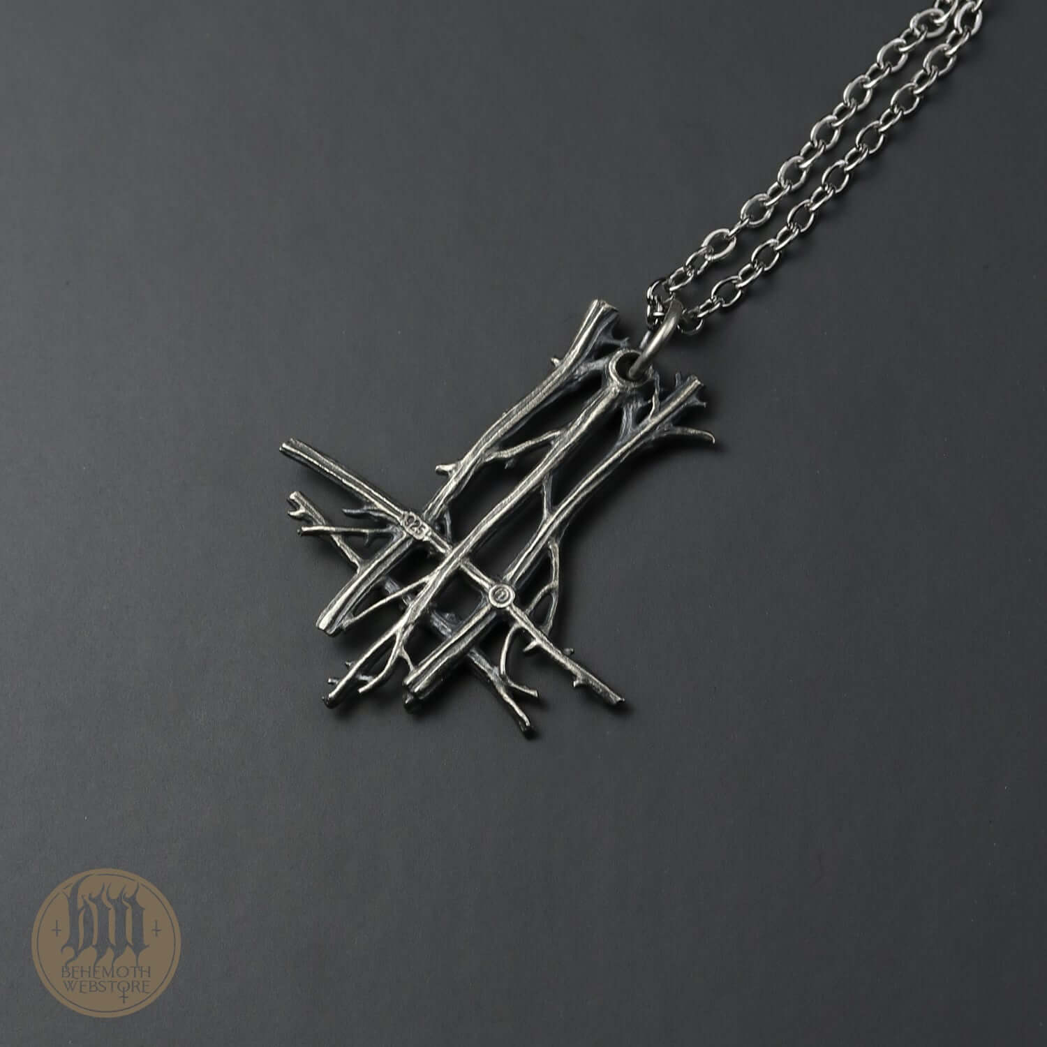 Sterling silver Trivmviratvs pendant necklace by Anna Mazon, detailed design, oxidized finish, on a stainless steel chain.