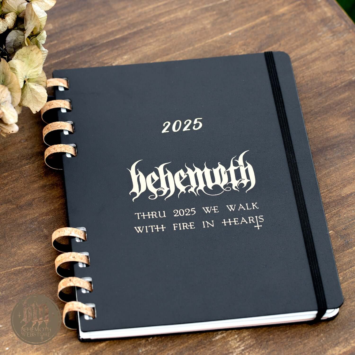 Limited edition Behemoth 'Thru 2025 We Walk' Moleskine calendar with spiral binding and black cover, featuring weekly and monthly layouts.