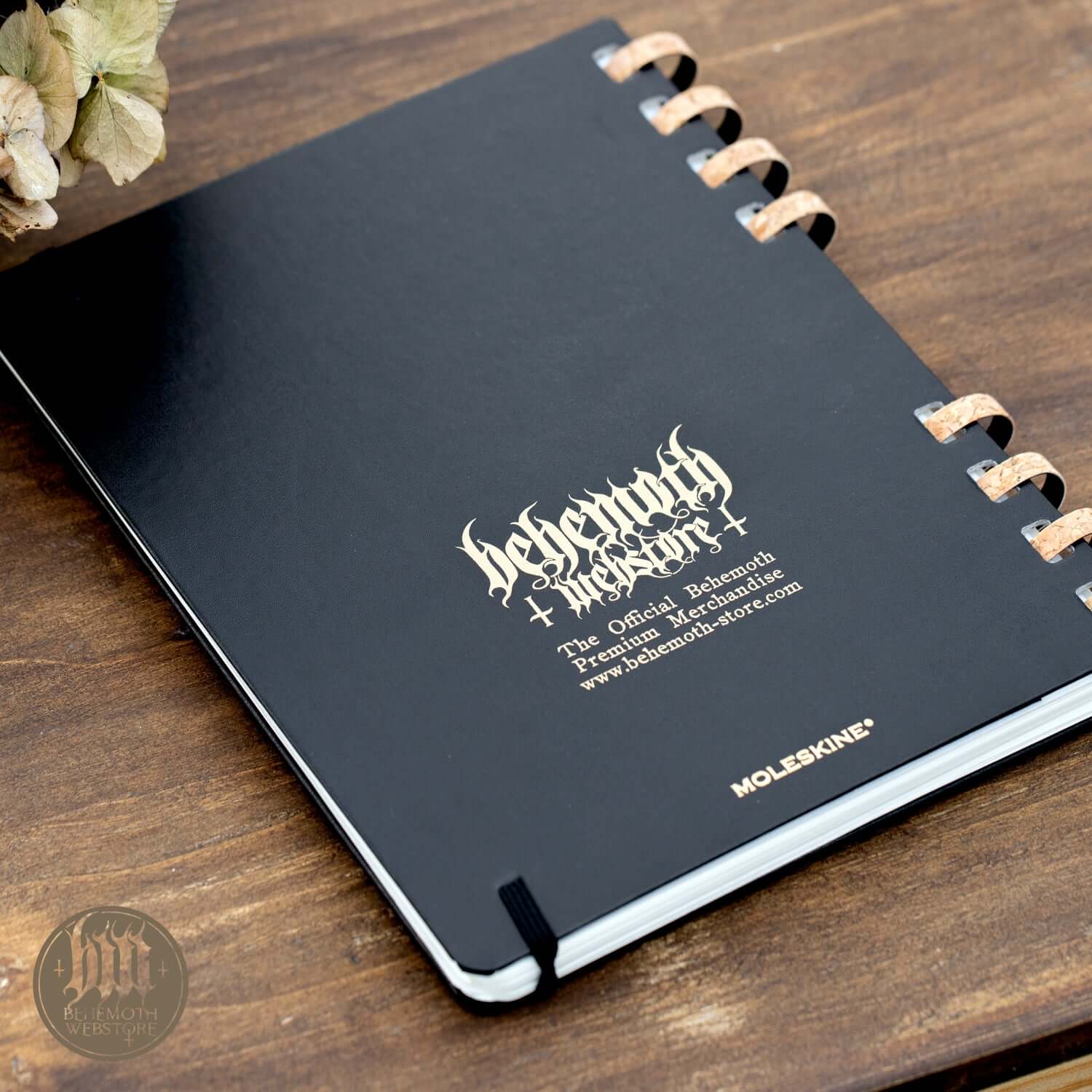Behemoth 'Thru 2025 We Walk' Moleskine 2025 Spiral Calendar on wooden surface, limited edition planner.