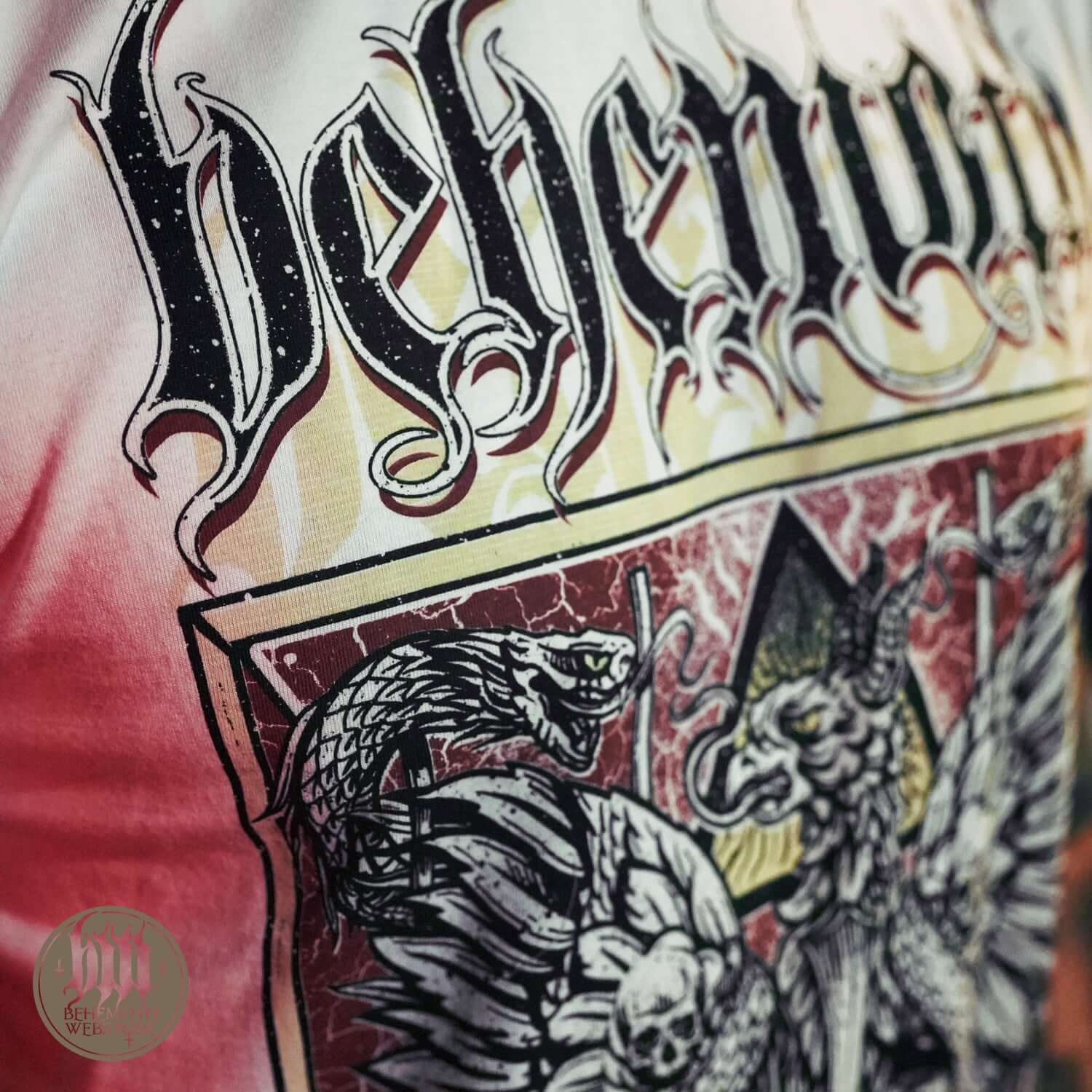 Close-up of 'The Republic Of The Unfaithful' Behemoth white T-shirt featuring intricate design symbolizing freedom and artistic expression.