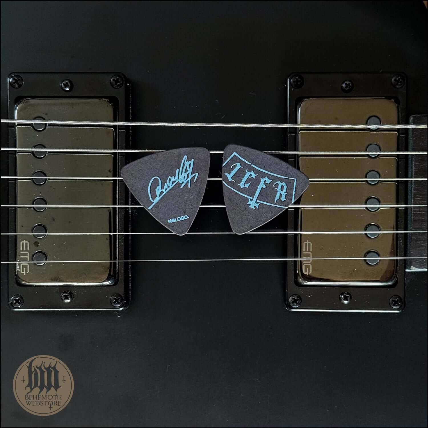 Orion signature plastic guitar picks 'LCFR' on electric guitar strings with EMG pickups, 0.88 mm thickness