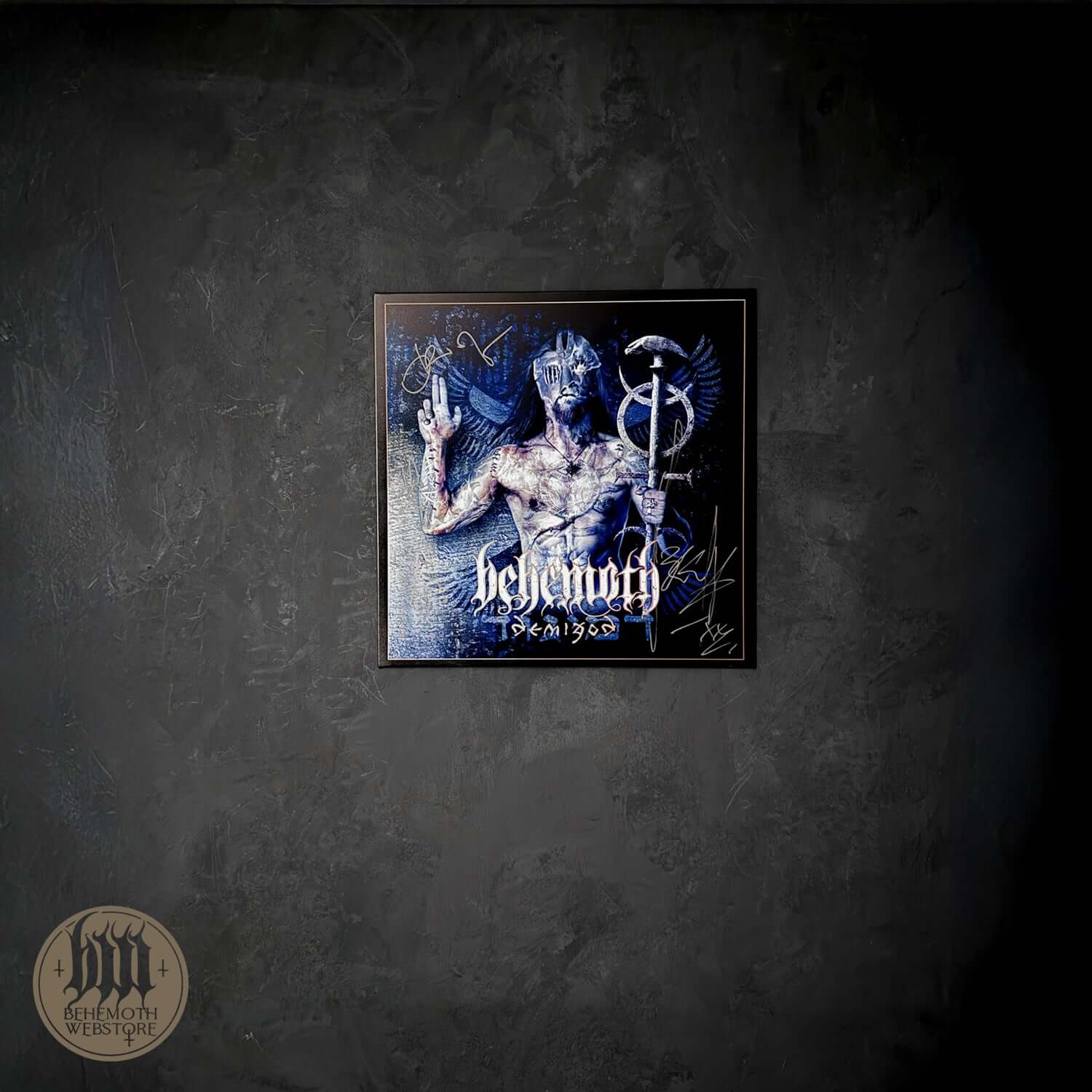 Print on metal plate of Behemoth 'Demigod XX,' signed by band members, featuring Bartek Rogalewicz's artwork.