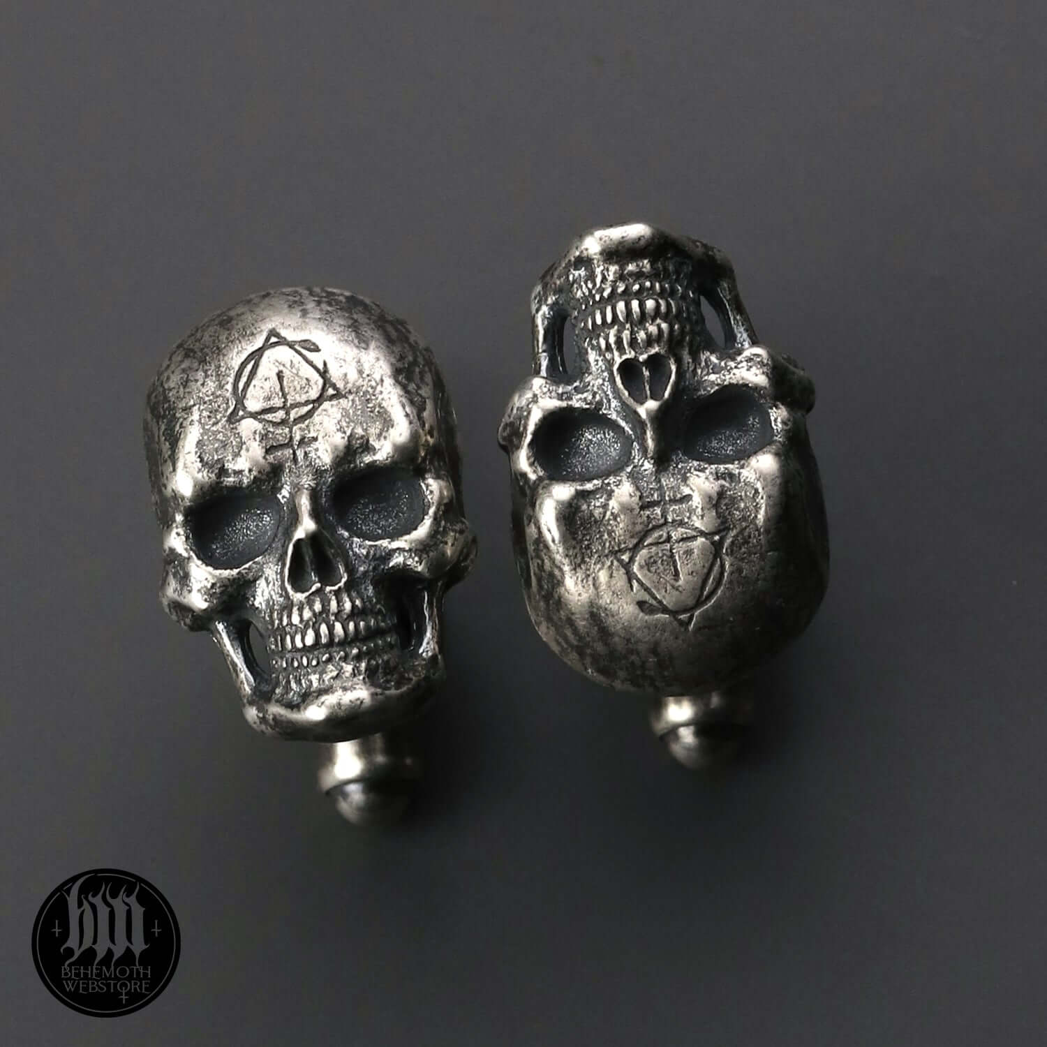 Behemoth 'Contra Skull' sterling silver cufflinks, hand-sculpted with detailed skull design, oxidized and polished finish.