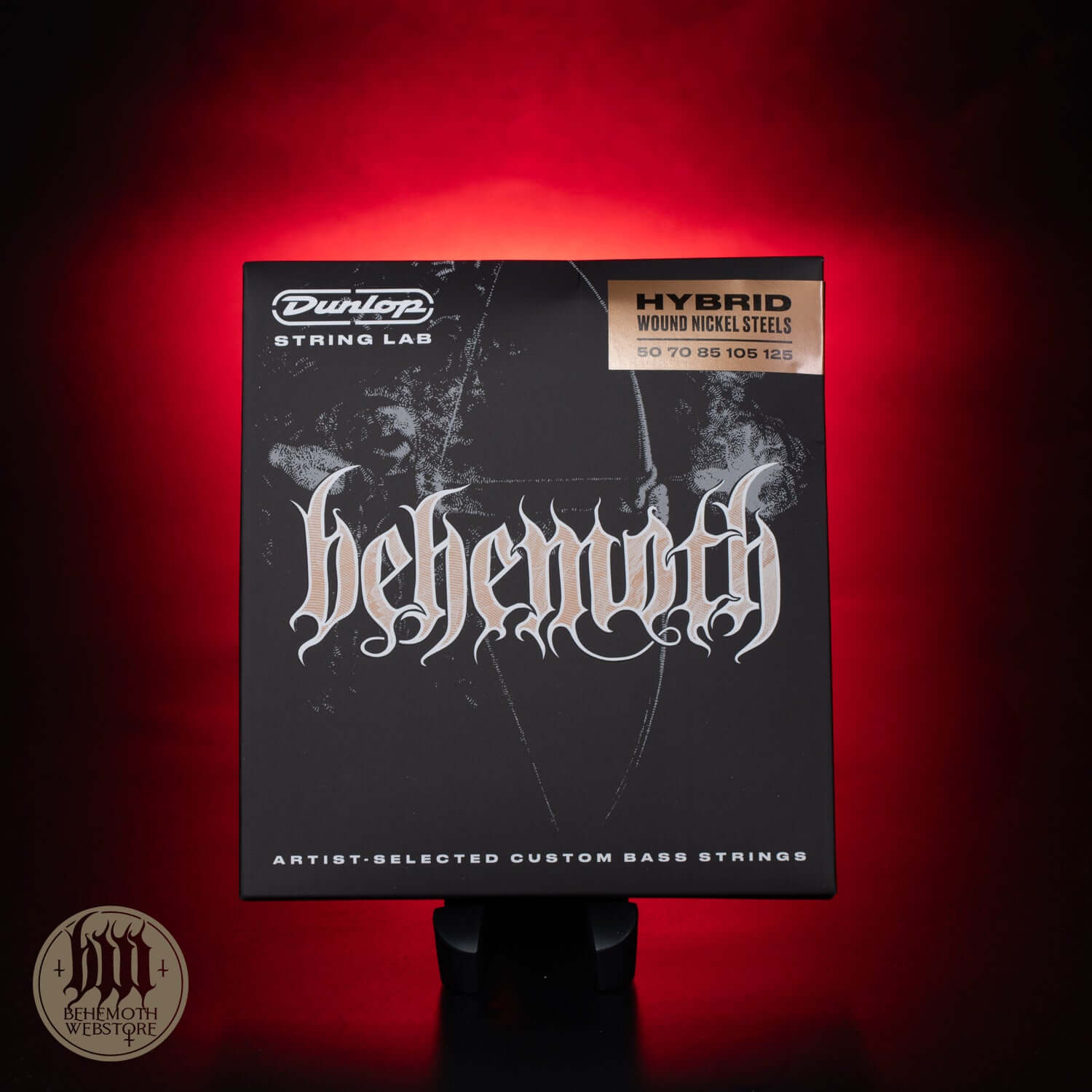 Dunlop Behemoth Hybrid Wound Nickel Bass Guitar Strings 50-125 on display with striking red background.