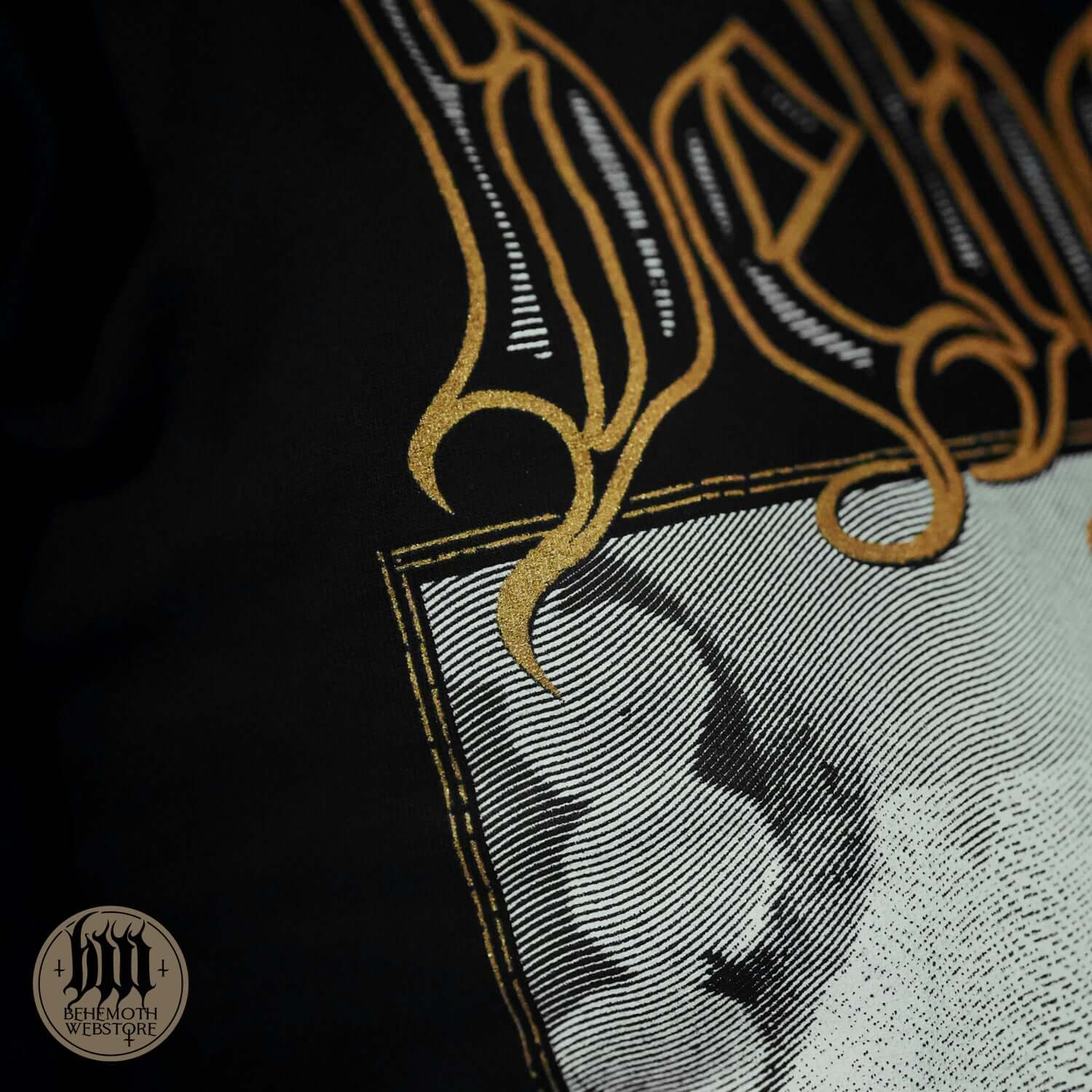 Close-up of Behemoth TSOG sigil design on black long sleeve shirt.