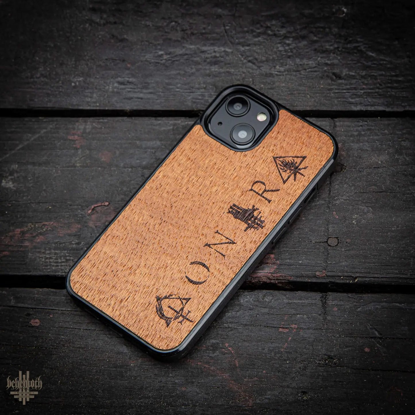 iPhone 13 case with wood finishing and Behemoth 'CONTRA' logo